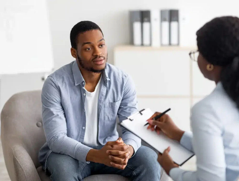 Man inquiring about individual therapy for addiction Man inquiring about individual therapy for addiction