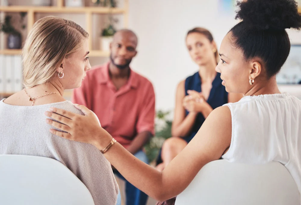 Psychology, mental health and support group with a woman in counseling for help with depression and anxiety with a psychologist she can trust. Communication, community or counselor with a sad patient group session for co-occurring mental health and fentanyl addiction